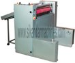 Laminated Roll to Sheet Cutter